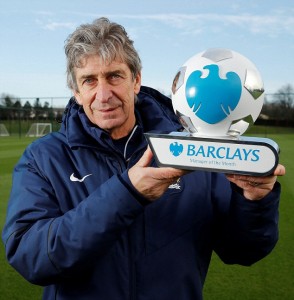 Pr Shoot - Barclays PR Shoot 14/01/2015 - Manchester City Training Ground - 14/1/15 Manchester City manager Manuel Pellegrini receives the Barclays manager of the month award for December Mandatory Credit: Action Images / Jason Cairnduff Livepic EDITORIAL USE ONLY.