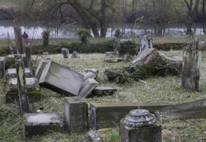 Desecrated tombstones of the Sarre-Union Jewish cemetery are pictured ahead of a ceremony with French President and officials