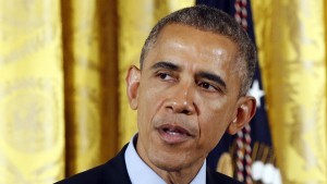 U.S. President Barack Obama delivers remarks before signing the Clay Hunt Suicide Prevention for American Veterans Act into law at the White House in Washington