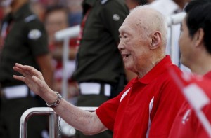 Singapore's former Prime Minister Lee waves during Singapore's national day parade celebrations