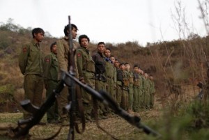 Rebel soldiers of Myanmar National Democratic Alliance Army (MNDAA) gather at a military base in Kokang region