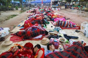 Student protesters sleep on the street during a protest against an education bill in Letpadan, Bago division