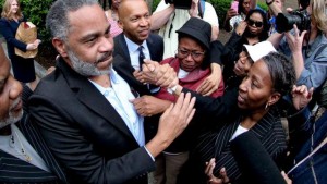 Anthony Ray Hinton is greeted by family outside the Jefferson County Jail in Birmingham, Alabama