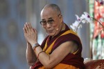 Exiled Tibetan spiritual leader, the Dalai Lama, gestures as he speaks to his followers during the Jangchup Lamrim teaching session at the Gaden Jangtse Thoesam Norling Monastery in Mundgod in the southern Indian state of Karnataka December 23, 2014. REUTERS/Abhishek N. Chinnappa (INDIA - Tags: RELIGION)