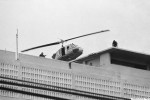 A U.S. Marine helicopter takes off from helipad on top of the American Embassy in Saigon, Vietnam, April 30, 1975. (AP Photo/Phu)