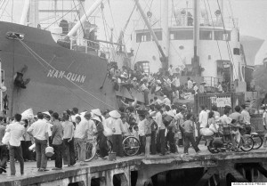 Last Viet evacuees by boat from Saigon water front in Saigon as PRG troops closing in on April 30, 1975. (AP Photo/Matt Franjola)