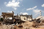 Mandatory Credit: Photo by APAImages/REX Shutterstock (4895357l)
Palestinian childern play on the ruins of houses
Life in Khan Younis, Gaza Strip, Palestinian Territory - 02 Jul 2015