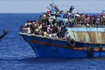 A migrant dives into the water from an overloaded wooden boat during a rescue operation 10.5 miles (16 km) off the coast of Libya, August 6, 2015. An estimated 600 migrants on the boat were rescued by the international non-governmental organisations Medecins sans Frontieres (MSF) and the Migrant Offshore Aid Station (MOAS) without loss of life on Thursday afternoon, according to MSF and MOAS, a day after more than 200 migrants are feared to have drowned in the latest Mediterranean boat tragedy after rescuers saved over 370 people from a capsized boat thought to be carrying 600. Picture taken August 6, 2015. REUTERS/Darrin Zammit Lupi  MALTA OUT. NO COMMERCIAL OR EDITORIAL SALES IN MALTA            TPX IMAGES OF THE DAY      - RTX1NL6L