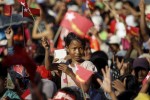 Supporters react as Myanmar pro-democracy leader Aung San Suu Kyi gives a speech during her campaign rally for the upcoming general elections in Toungup, Rakhine state, October 16, 2015. REUTERS/Soe Zeya Tun