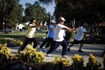 Johney Yu (2nd R), 75, who emigrated from China 40 years ago, and Diana Yang (L), who emigrated from China 28 years ago, practice tai chi at a daily class in Alhambra, home of many Chinese and Vietnamese migrants, in California August 14, 2014. REUTERS/Lucy Nicholson