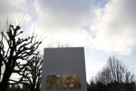 A FIFA sign is seen outside the FIFA headquarters in Zurich, Switzerland December 17, 2015. REUTERS/Ruben Sprich