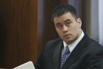 Daniel Holtzclaw sits in a courtroom in Oklahoma City, Monday, Nov. 2, 2015, for jury selection in his trial. Holtzclaw is a former Oklahoma City police officer facing dozens of charges alleging he sexually assaulted women while on duty. (AP Photo/Sue Ogrocki)