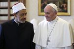 Pope Francis (R) talks with Egyptian Grand Imam of al-Azhar Mosque Sheikh Ahmed Mohamed al-Tayeb (L) during a private audience at the Vatican on May 23, 2016. 
Pope Francis met the Grand Imam of Cairo's Al-Azhar Mosque at the Vatican on Monday in a historic encounter that was sealed with a hugely symbolic hug and exchange of kisses. / AFP / POOL / MAX ROSSI        (Photo credit should read MAX ROSSI/AFP/Getty Images)