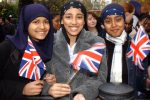 (L to R) Bushra Rahman15, Muktha Sikdar14 and Rahayla Kurshid 14 from Camden School for girls who had a photo taken with The Queen at the Memorial Gates on Constitution Hill, London which were officially Inaugurated by the Queen.   * The memorial is to recognise the contribution and sacrifice made by Ethnic service men and women.