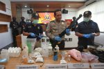 Indonesian police show items recently seized, including weapons and bomb-making materials, that they say were intended for use to attack government buildings and the Myanmar embassy, at police headquarters in Jakarta, Indonesia November 25, 2016 in this photo taken by Antara Foto.   Antara Foto/Reno Esnir/via REUTERS