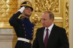 Russian President Vladimir Putin arrives to take part in a ceremony of receiving diplomatic credentials from foreign ambassadors in the Kremlin in Moscow, Russia, Wednesday, Nov. 9, 2016. Putin says that Moscow is ready to try to restore good relations with the United States in the wake of the election of Donald Trump. (Sergei Karpukhin/Pool photo via AP)