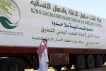 A saudi man walks next to a truck loaded with aid offered by King Salman Center for Relief and Humanitarian Aid to be sent to the Yemeni people, in Riyadh April 17, 2016. REUTERS/Faisal Al Nasser  - RTX2ACFF