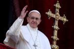 FILE PHOTO: Pope Francis waves after delivering his "Urbi et Orbi" (to the city and the world) message from the balcony overlooking St. Peter's Square at the Vatican December 25, 2016. REUTERS/Alessandro Bianchi/File Photo