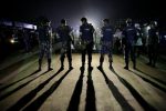 Security personnel block a road outside the Kashimpur jail during the execution of three Islamists in Dhaka, Bangladesh, April 13, 2017. REUTERS/Stringer