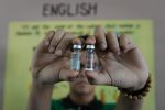 MANILA, PHILIPPINES - APRIL 04:  A government nurse holds up a vial of Dengvaxia, the world's first licensed dengue vaccine on April 4, 2016 in Manila, Philippines. The Philippines launched its first public immunization program for dengue fever for more than a million children on Monday, which was the world's first licensed vaccine against the disease that infects 390 million people a year globally, based on the World Health Organization.  (Photo by Dondi Tawatao/Getty Images)