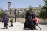 A picture taken on July 7, 2017 shows Palestinians walking by outside the Cave of the Patriarchs, also known as the Ibrahimi Mosque, which is a holy shrine for Jews and Muslims, from the Palestinian side in the heart of the divided city of Hebron in the southern West Bank.
On July 7, 2017 UNESCO declared in a secret ballot the Old City of Hebron in the occupied West Bank a protected heritage site.
Hebron is home to more than 200,000 Palestinians, and a few hundred Israeli settlers who live in a heavily fortified enclave near the site known to Muslims as the Ibrahimi Mosque and to Jews as the Cave of the Patriarchs. / AFP PHOTO / HAZEM BADER