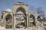 A picture taken on June 30, 2017, shows the destroyed gate of the Al-Nuri Mosque in the Old City of Mosul, as Iraqi government forces continue their offensive to retake the city from Islamic State (IS) group jihadists.
IS blew up the mosque and the famed Al-Hadba (hunchback) leaning minaret on June 21 as Iraqi forces closed in. / AFP PHOTO / AHMAD AL-RUBAYE