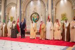 U.S. President Donald Trump (5-L) prepares for a family photo with Saudi Arabia's King Salman bin Abdulaziz Al Saud (6-R) heads of state at the Gulf Cooperation Council leaders summit in Riyadh, Saudi Arabia May 21, 2017. Bandar Algaloud/Courtesy of Saudi Royal Court/Handout via REUTERS ATTENTION EDITORS - THIS PICTURE WAS PROVIDED BY A THIRD PARTY. FOR EDITORIAL USE ONLY.