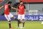 Egypt's forward Mohamed Salah (L) takes a free kick to score a goal during the 2017 Africa Cup of Nations group D football match between Egypt and Ghana in Port-Gentil on January 25, 2017. / AFP PHOTO / Justin TALLIS