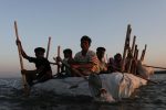 Rohingya refugees sail on an improvised raft across the Naf River to reach Bangladesh, in Teknaf, Bangladesh, November 29, 2017. REUTERS/Susana Vera