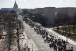 Thousands of local students march down Pennsylvania Avenue to the US Capitol during a nationwide student walkout for gun control in Washington, DC, March 14, 2018.
Students across the US walked out of classes on March 14, in a nationwide call for action against gun violence following the shooting deaths last month at a Florida high school. The nationwide protest is being held one month to the day after Nikolas Cruz, a troubled 19-year-old former student at Stoneman Douglas, unleashed a hail of gunfire on his former classmates. / AFP PHOTO / SAUL LOEBSAUL LOEB/AFP/Getty Images