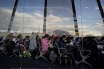 Filipina workers returning home from Kuwait fill out forms upon their arrival at Manila International Airport on February 18, 2018.
After a horrific murder of a Philippine maid in Kuwait, hundreds of such women are now streaming back home, recounting their abuse and hardship-- but also saying they are ready to work abroad again. / AFP PHOTO / NOEL CELIS