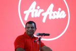 AirAsia Group CEO Tony Fernandes speaks during a news conference at the AirAsia headquarters in Sepang, Malaysia December 13, 2017. REUTERS/Lai Seng Sin - RC14A3EF6BF0