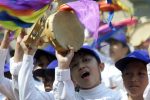 Indonesian Christian women perform tambourine dance at a prayer rally in Senayan stadium in central Jakarta October 14, 2000. Hundreds of Christians prayed to save the nation from further religious violence that have raged in Indonesia in recent years.

PRI/CC - RP2DRHZVZNAB