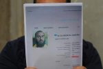 An Iraqi man holds printed profiles of Abu Bakr al-Baghdadi released by Iraqi authorities on February 6, 2018.
Iraqi authorities issued a new list of "internationally wanted terrorists," headed by Islamic State group leader Abu Bakr al-Baghdadi.  / AFP PHOTO / AHMAD AL-RUBAYE