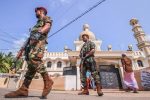 Sri Lankan military stand guard outside a mosque after clashes between two sectarian groups in a beachside resort in Poruthota village in Negombo, Sri Lanka May 6, 2019. REUTERS/Stringer NO RESALES. NO ARCHIVES.