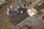 Drone pictures show bodies being buried on New York's Hart Island where the department of corrections is dealing with more burials overall, amid the coronavirus disease (COVID-19) outbreak in New York City, U.S., April 9, 2020. REUTERS/Lucas Jackson