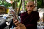 Buddhist monk Ottamasara, the abbot of Thabarwa meditation center, holds a recycled plastic bottle filled with plastic bags at Thabarwa in Thanlyin in Yangon, Myanmar, September 4, 2020. REUTERS/Shew Paw Mya Tin