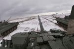 Tanks ride during joint exercises of the armed forces of Russia and Belarus as part of an inspection of the Union State's Response Force, at a firing range in Belarus, in this still image from a handout video released February 2, 2022. Russian Defence Ministry/Handout via REUTERS